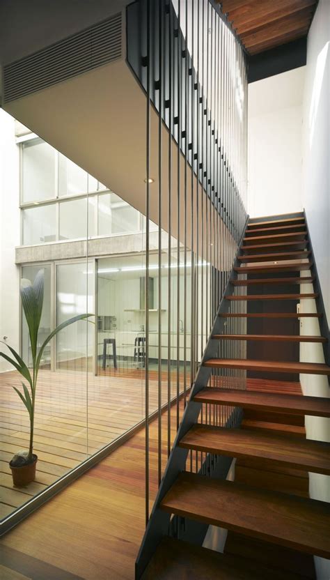 The Stairs Are Made Of Wood And Glass