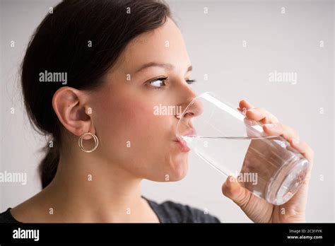 Thirsty Woman Drinking Water From Glass Close Up Stock Photo Alamy