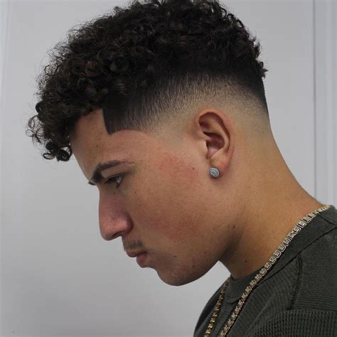 40 Ultra Cool Curly Taper Fade Haircuts For Men In 2025