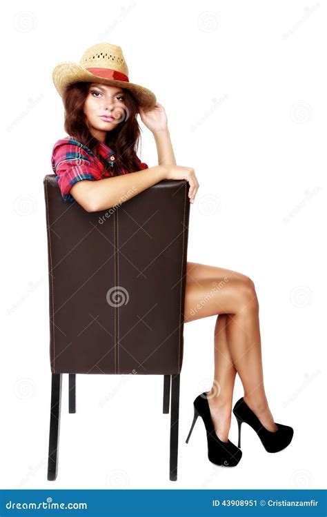 Woman Cowgirl Sitting On A Chair Isolated On White Stock 26880 Hot Sex Picture