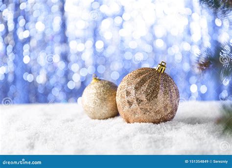 Christmas Baubles on Snow Against Blurred Lights Stock Image - Image of ...