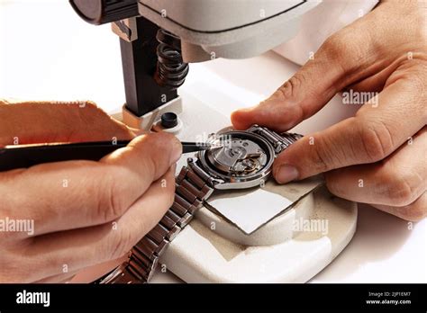 Closeup Watchmaker S Hands Repairing Mechanical Watches Isolated Over