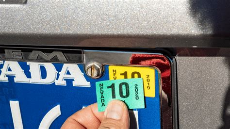 how to remove car tag sticker