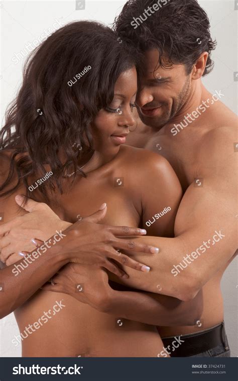 Loving Affectionate Nude Interracial Heterosexual Couple Stock Photo