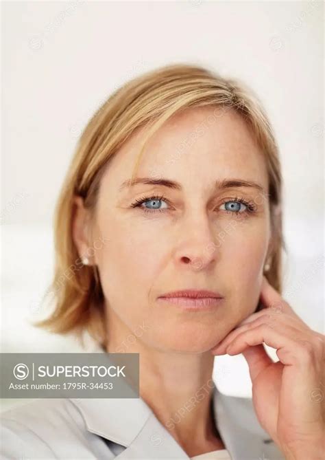 Portrait Of Mature Business Woman SuperStock