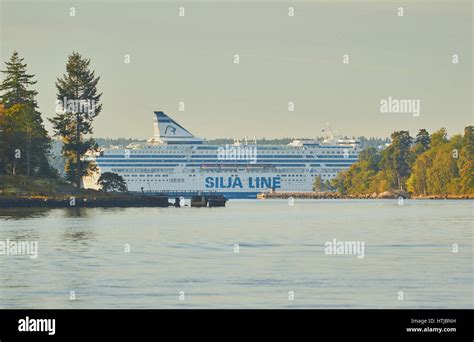 Cruise ship passing between islands in the Stockholm archipelago ...