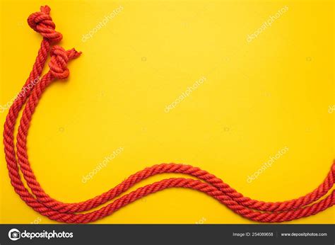 Red Waved Ropes Knots Isolated Orange — Stock Photo © VadimVasenin #254089658