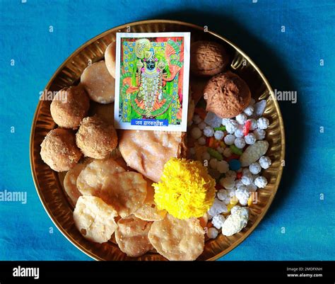 Assorted Prasadam /Offering of Shree Dwarkadhish Temple in a copper ...