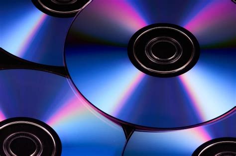 Premium Photo | Closeup of the shiny colorful dvd discs