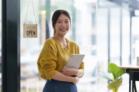 Portrait Of Startup Successful Small Business Owner In Coffee Shop Sme