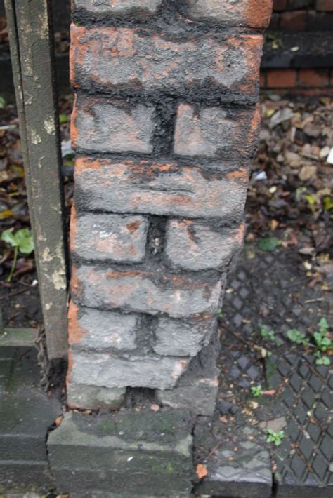 Benchmark On Party Wall Between Steps To Roger Templeman