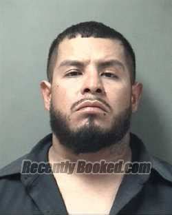 Recent Booking Mugshot For Roberto Romero In Galveston County Texas