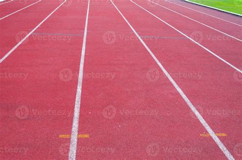 Running Track And Green Grass Direct Athletics Running Track At Sport Stadium 33061979 Stock