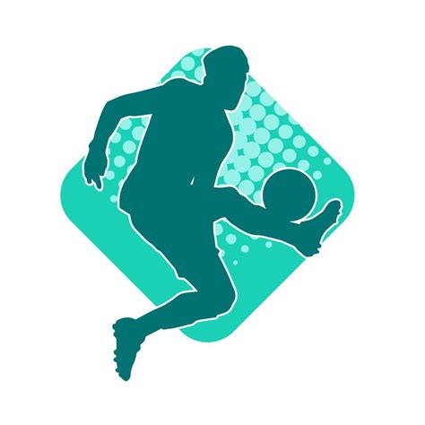 Silhouette of a male soccer player kicking a ball. Silhouette of a ...