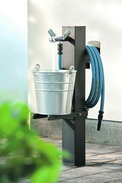 Water tap | Garden hose holder, Diy water, Garden design