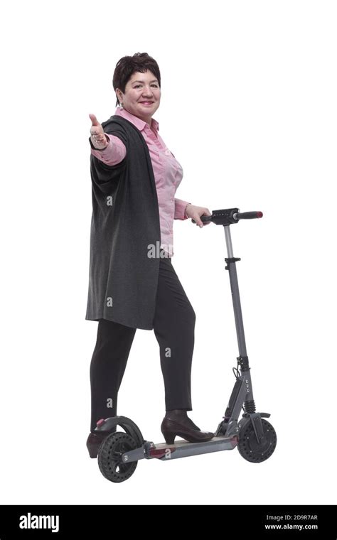 Rear View Mature Woman Leaving On An Electric Scooter Stock Photo Alamy