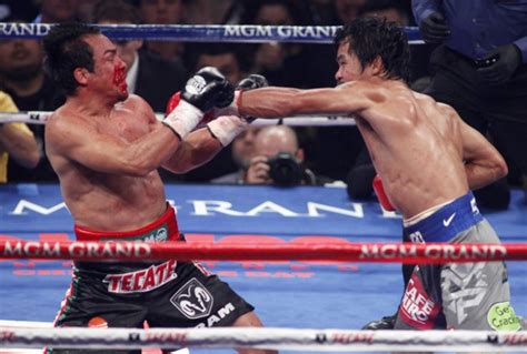 Juan Manuel Marquez Knocks Out Manny Pacquiao In The Sixth Round