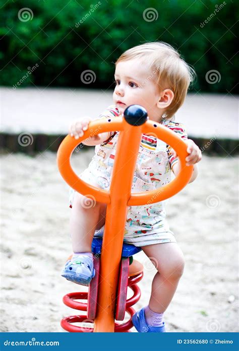 Little Blonde Boy Playing On The Swing Summer Stock Photo Image Of