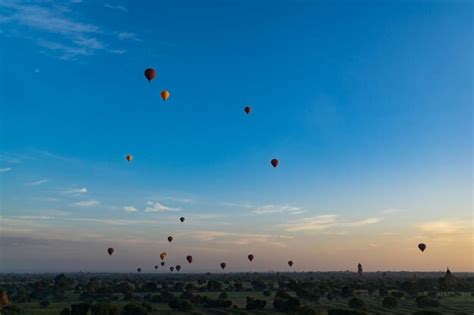 Premium Photo Hot Air Balloons Flying In Sky During Sunset