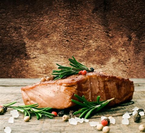 Premium Photo Beef Steak On A Wooden Table