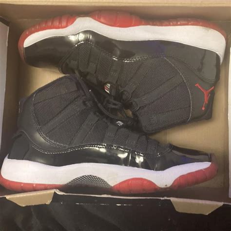 Used Jordan 11 bred 2012 With box but damaged... - Depop