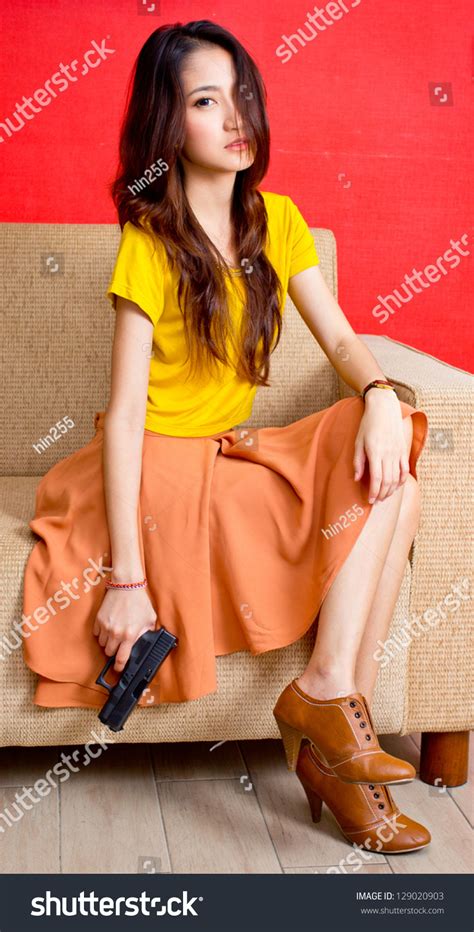 Portrait Beautiful Asian Girl Holding Gun Stock Photo 129020903