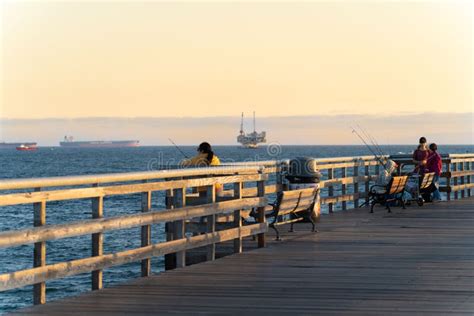 Family Fishing at the Seal Beach Pier on the Sunset Editorial Photo ...