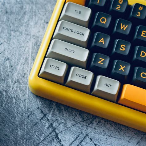 Close Up Photo Of A Yellow Computer Keyboard · Free Stock Photo