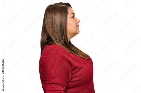 Beautiful Brunette Plus Size Woman Wearing Casual Clothes Looking To Side Relax Profile Pose