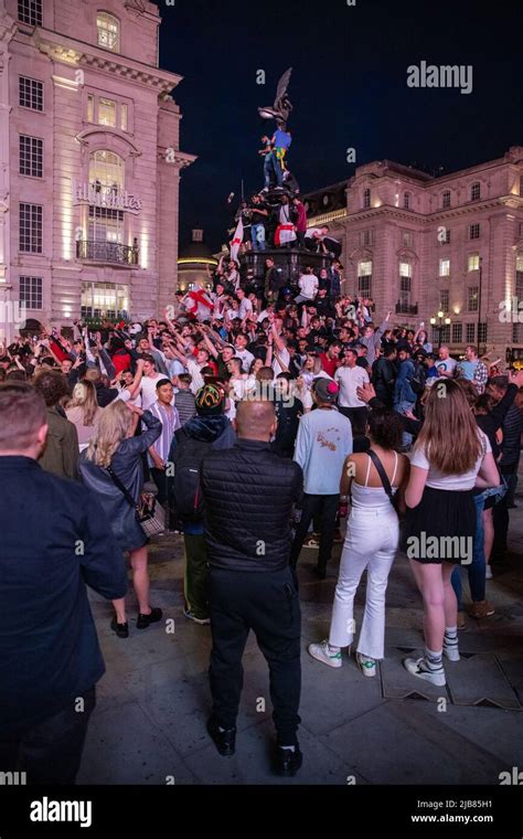 England Football Fans Celebrate In Piccadilly Circus After Their Win In