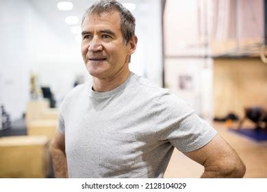 Confident Mature Man Hands On Hips Stock Photo 2128104029 Shutterstock