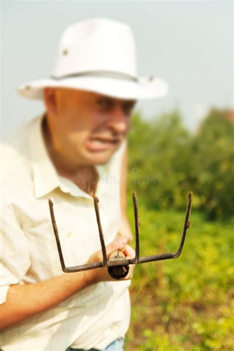 Farmer Holding Pitchfork Stock Images Image 15677894