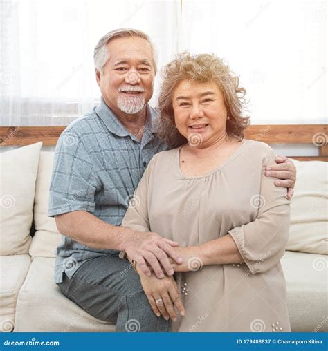 Portrait Of Elderly Senior Asian Couple Happy Together At Home Elder