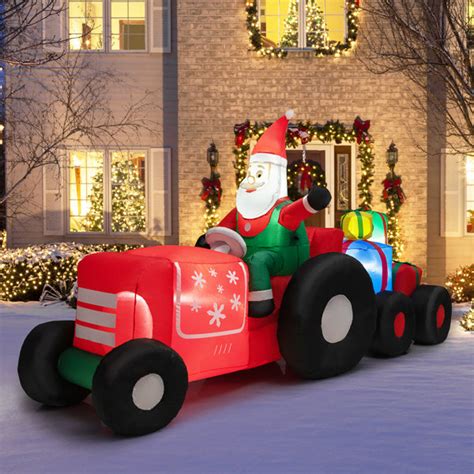 The Holiday Aisle® Santa Claus Driving Tractor Inflatable Wayfair