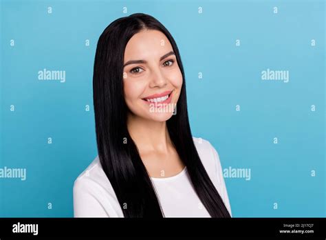 Photo Of Nice Brunette Millennial Lady Look Camera Wear Outfit Isolated On Blue Color Background