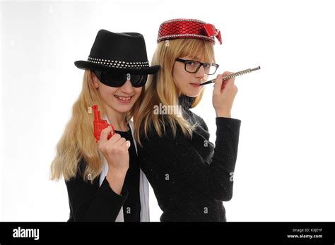 Two Pretty Blonde Caucasian Girls Dressed As Gangster And Moll Isolated On White Stock Photo