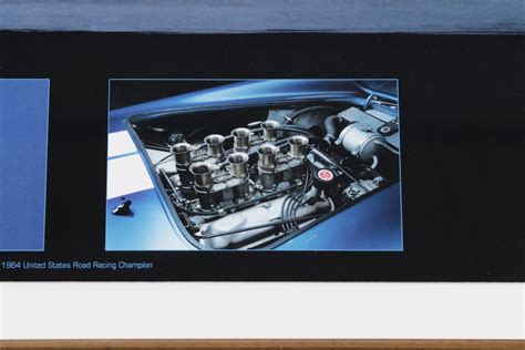 Framed poster of Ken Miles winning in a Shelby Cobra | Pedal to the Metal