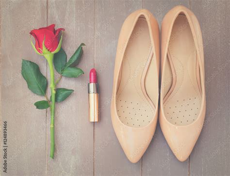 Nude Colored High Heels Still Life With Red Rose Bud And Lipstick Top View Retro Toned Stock