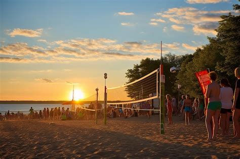Premium Photo Beach Volleyball Tournament In Progress With Spectators