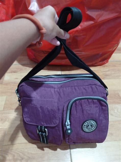 TAS SLING ALA KIPLING BANYAK RUANG UNGU Fesyen Wanita Tas Dompet Di