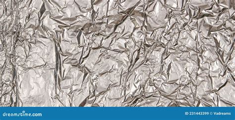 Silver Shiny Crumpled Foil Texture Background Top View Stock Image