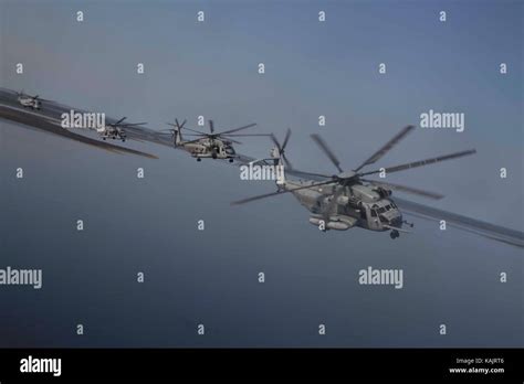 Four CH 53 Super Stallions Conduct An In Flight Turn During A Formation