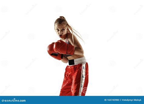 Young Female Kickboxing Fighter Training Isolated On White Background