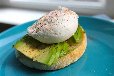 Homemade Poached Egg And Avocado On Toasted Sourdough English Muffin Food