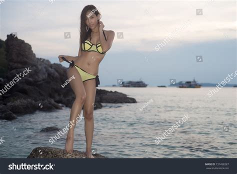 Sexy Asian Woman Yellow Bikini Two Stock Photo Shutterstock