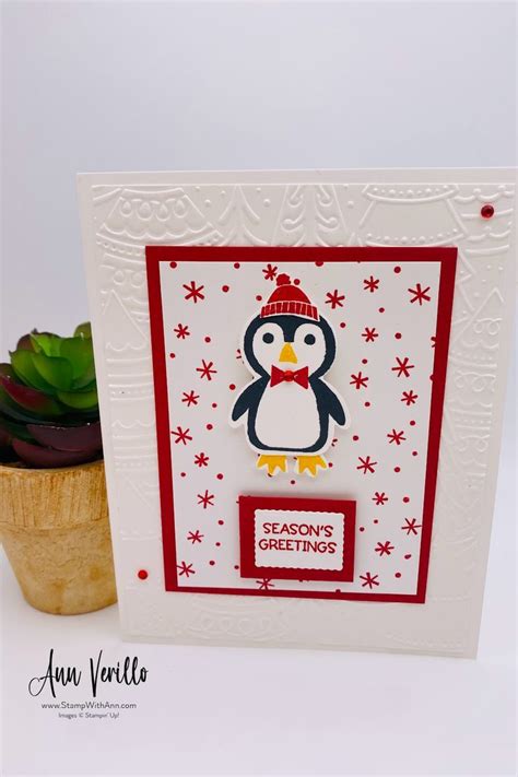 A Card With A Penguin On It And A Potted Plant In The Background That