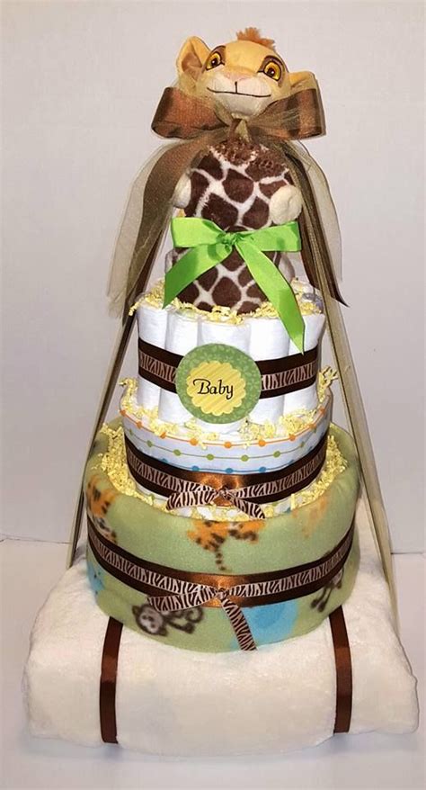 4 Tier Diaper Cake With Diapers Blankets And Plush Animal
