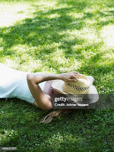 Woman Sleeping In Grass Photos And Premium High Res Pictures Getty Images