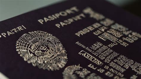 Closeup Of A Person Holding A Passport Premium Ai Generated Image