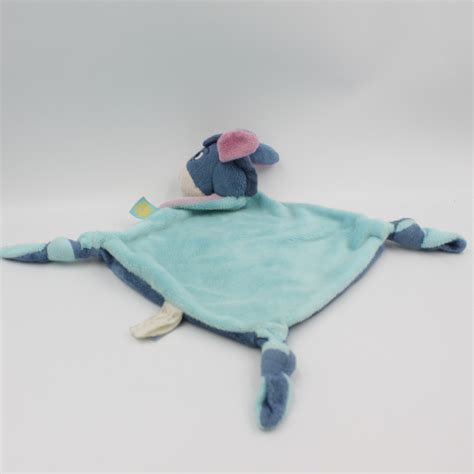 Doudou Plat Noeuds Bourriquet Bleu Mauve Fleur Disney